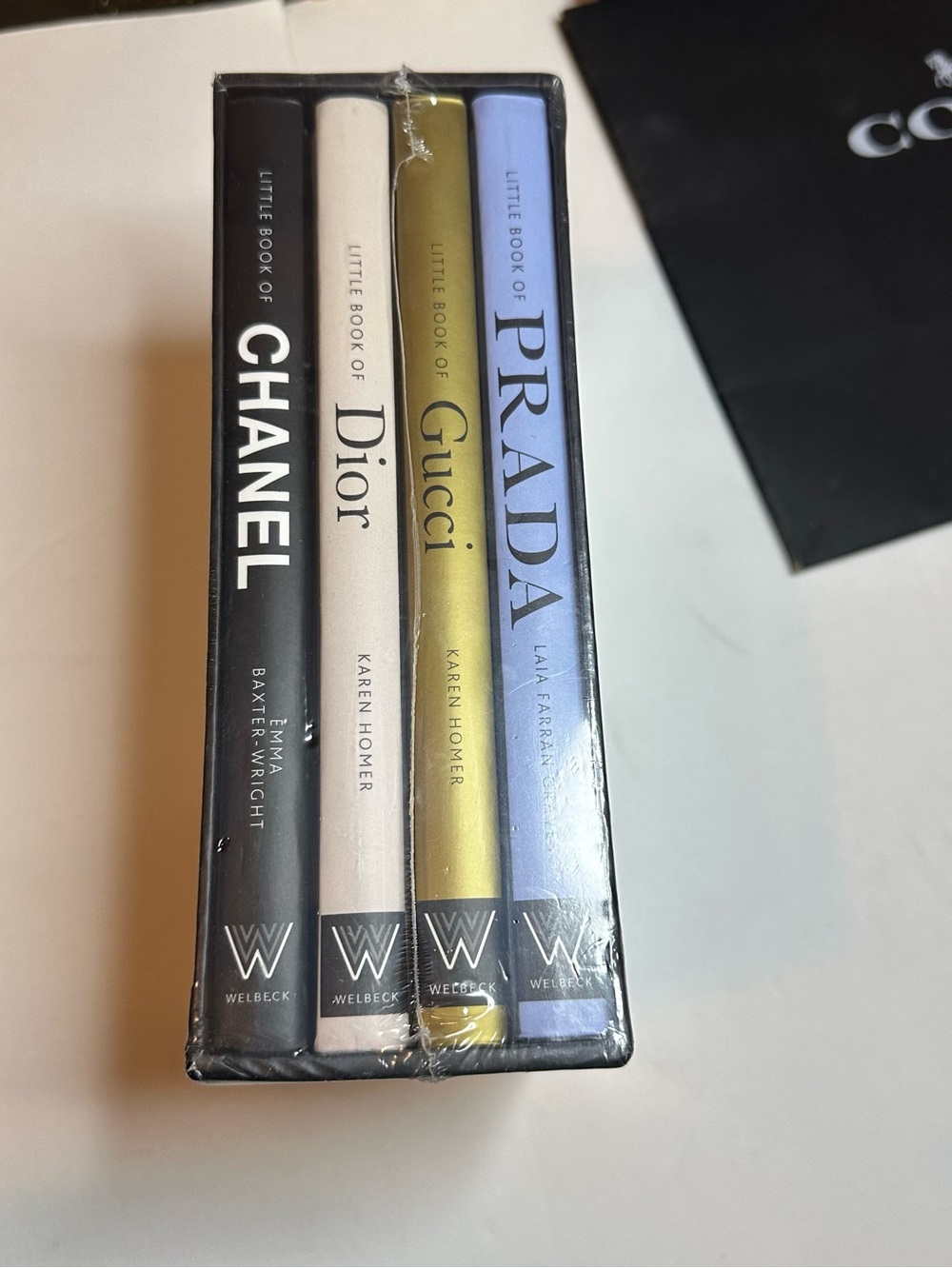 NWT Gucci Gold Little Book set - Black, Cream, Gold, Light Blue spines